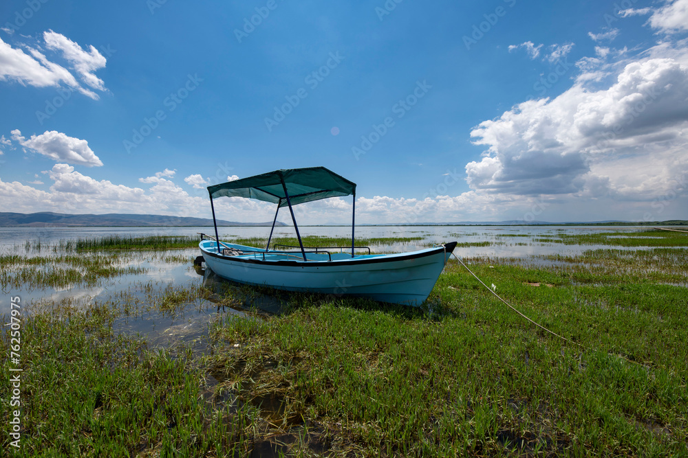 Decorated day-trip boats in Isikli Lake in Denizli's Civril district. Isıkli Lake is flooded with visitors during lotus time. It is also a popular lake for hunters. Decorated day-trip boats in Isikli Lake in Denizli's Civril district. Isıkli Lake is flooded with visitors during lotus time. It is also a popular lake for hunters.