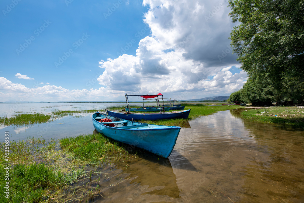 Decorated day-trip boats in Isikli Lake in Denizli's Civril district. Isıkli Lake is flooded with visitors during lotus time. It is also a popular lake for hunters. Decorated day-trip boats in Isikli Lake in Denizli's Civril district. Isıkli Lake is flooded with visitors during lotus time. It is also a popular lake for hunters.