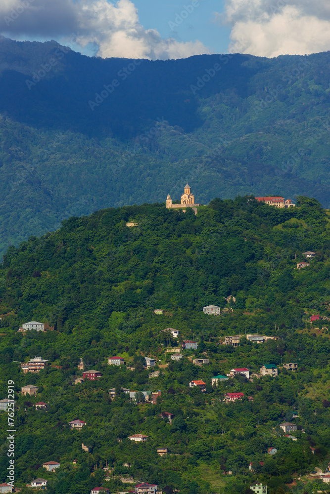 Fototapeta premium View of Batumi and hazy mountains from distance 