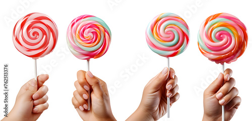 child little hand holding lollipop