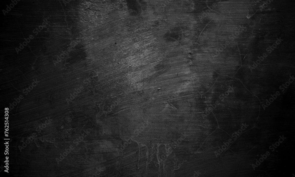 Black concrete texture as a concept of horror and Halloween. Dark wall background cement or stone.