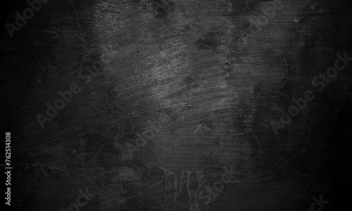 Black concrete texture as a concept of horror and Halloween. Dark wall background cement or stone. © Jennyfer