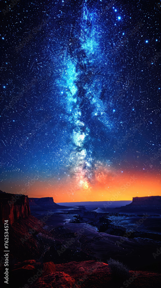 Starry night sky over desert landscape - The milky way galaxy shines brightly above a serene desert landscape, portraying vastness