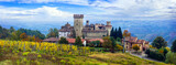 Medieval scenic villages and castles of Italy -Vigoleno with autumn vineyards in Emilia-Romagna region.