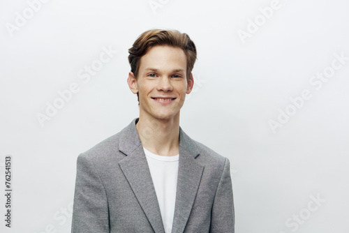 Confident Young Businessman in Modern Studio - A Portrait of Success and Happiness © SHOTPRIME STUDIO
