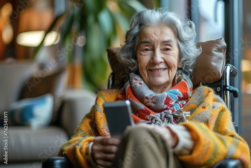 Embracing Technology Portrait of a Smiling Senior Woman on Wheelchair, Engaging with the Digital World through Her Smartphone at Her Comfortable Living Home