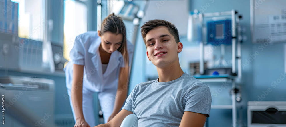 Rehabilitation therapy. Physiotherapist working with young male patient in the rehabilitation center Rehabilitation therapy. Physiotherapist working with young male patient in the rehabilitation center