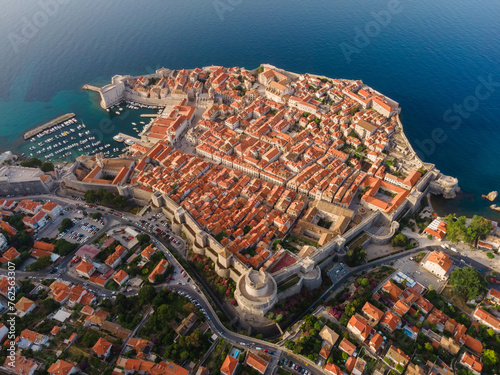 Aerial establishing shot of old town of Dubrovnik, Dalmatia, Croatia. Medieval city fortress on the coast of Adriatic sea. Drone view. Travel destination