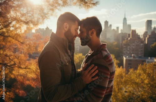 Autumn Romance: Loving Gay Male Couple Embracing in City Park