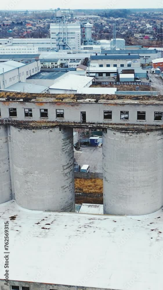 Big chemical factory. Aerial view of an old building against the backdrop of a new modern factory. Vertical video. Big chemical factory. Aerial view of an old building against the backdrop of a new modern factory. Vertical video.