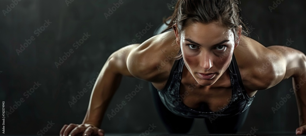 Dynamic fitness session  european woman shows strength in workout poses against studio background