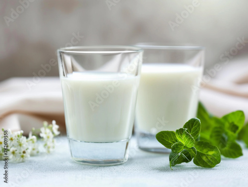 Milk Glasses with Fresh Mint on Table