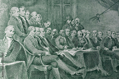 The process of signing the US Declaration of Independence July 4, 1776 on a dollar bill