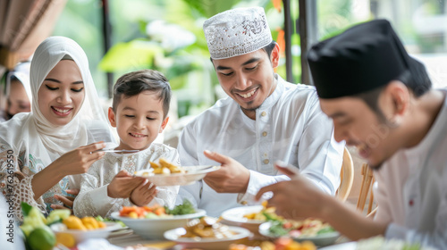 Muslim families eat together in the month of Ramadan