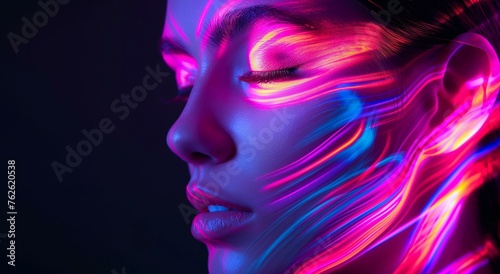Close-up portrait of a woman model with neon lights, light painting effect