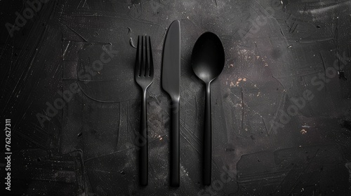 Elevate your dining experience with a set of sleek cutlery - fork, knife, and spoon, ready for any culinary occasion