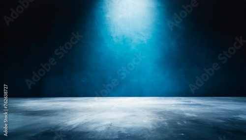 empty space of studio dark room concrete floor grunge texture background with blue lighting effect for product showing