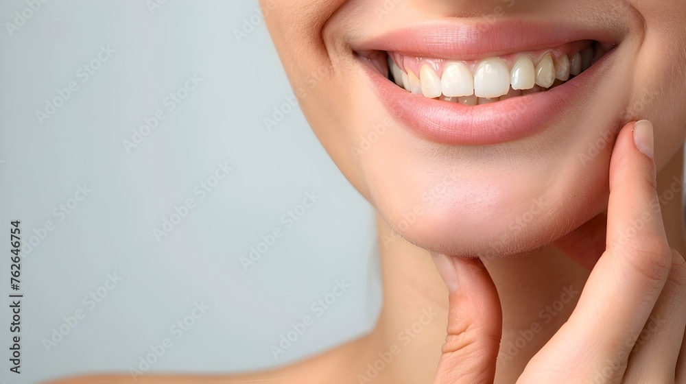 Fototapeta premium Close-Up Caucasian Woman's Beautiful Teeth Hand Touching Chin