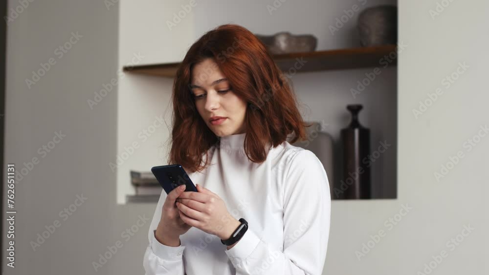 Displeased young business woman looking at smartphone screen, dissatisfied with bad news message, spam or scam sms. Unhappy stressed female mobile app user getting phishing link in email. Displeased young business woman looking at smartphone screen, dissatisfied with bad news message, spam or scam sms. Unhappy stressed female mobile app user getting phishing link in email.