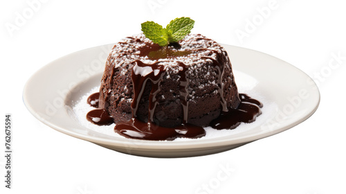 A white plate holding a rich chocolate cake