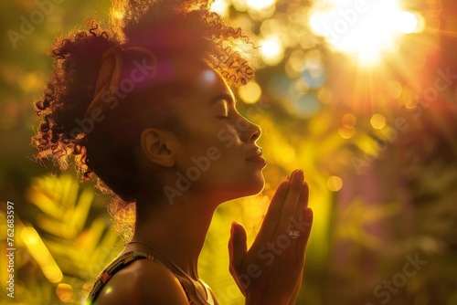 African American woman seeking God in prayer