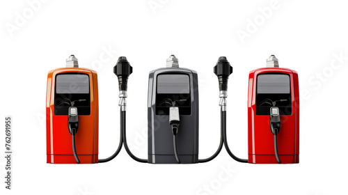 A trio of gas pumps, each a different style and color, standing side by side photo