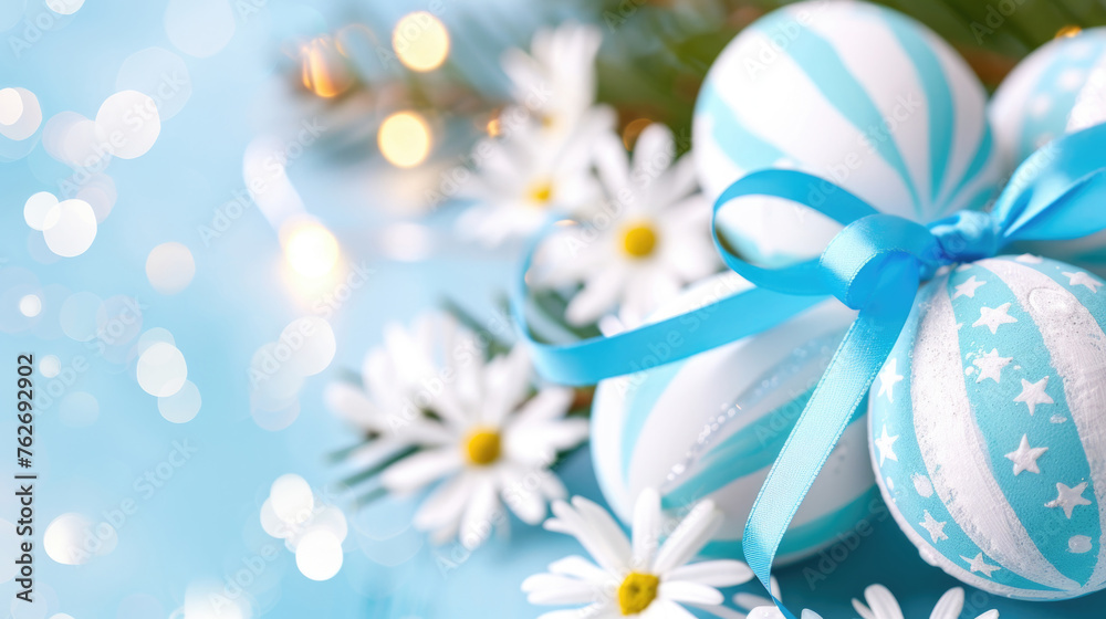 Obraz premium Blue and white Christmas ornament adorned with delicate daisies, adding touch of charm and elegance to holiday decor