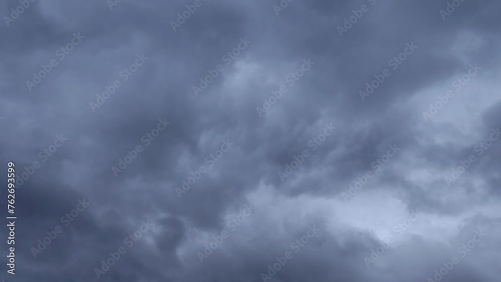 Dark stratocumulus sky with strange shaped clouds Dark stratocumulus sky with strange shaped clouds
