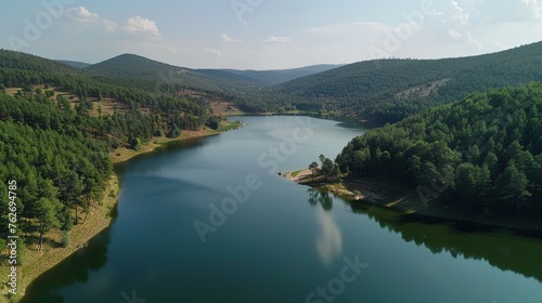 Aerial drone view the river with stretches of deep forest.