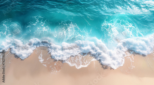 Aerial view of ocean waves crashing on sandy beach. Nature seascape background. Concept for travel  summer  and tropical design.