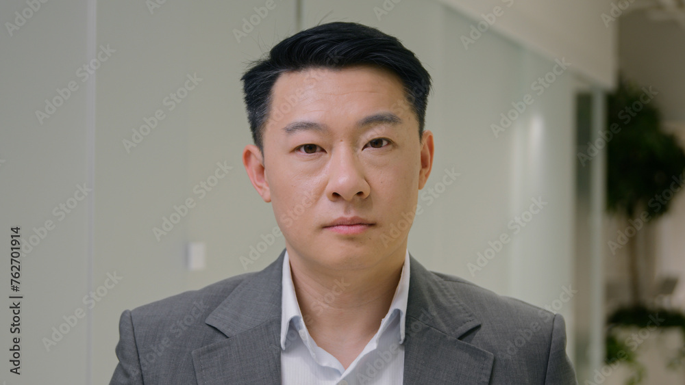 Portrait serious calm Asian ethnic man business employer peaceful Korean businessman Chinese male Japanese middle-aged guy at office hallway confident looking at camera executive CEO in formal suit Portrait serious calm Asian ethnic man business employer peaceful Korean businessman Chinese male Japanese middle-aged guy at office hallway confident looking at camera executive CEO in formal suit