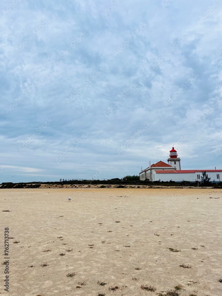 View to the lighthouse, white and red lighthouse