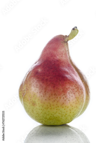 An upright ripe juicy golden and red pear isolated against a flat background. 2