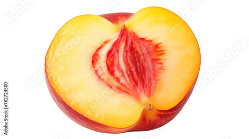 A fresh peach delicately cut in half, revealing its vibrant golden flesh against a pristine white backdrop