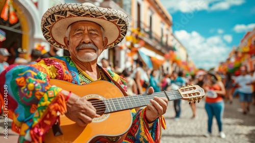 Mexican street musician plays guitar at carnival