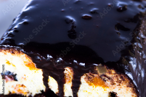 Curd cheesecake in chocolate on a plate