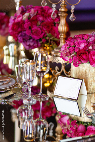 Elegant event table setting gold white magenta red