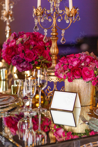 Elegant event table setting gold white magenta red