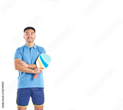 asian boy in shorts and blue polo shirt with a pickleball paddle in his hands on white background