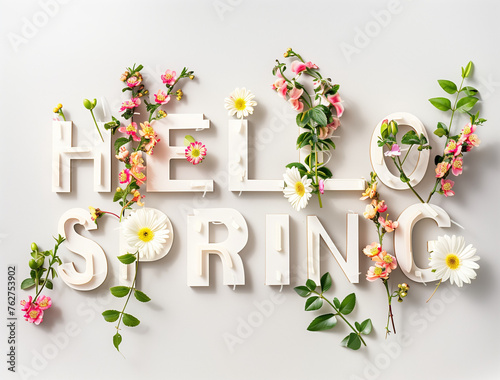 Creative layout made with colorful various flowers. Minimal inscription Hello spring background concept.Suitable for advertising all kinds related to spring.Copy space,top view,flat lay photo