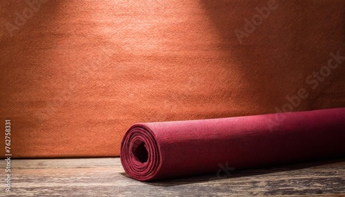 photo background is orange red textured wall rolling in the floor studio photography background illuminated by the directed light traditional painted canvas or muslin fabric cloth studio backdrop