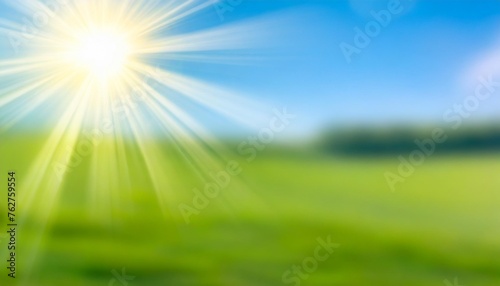 sun shine on summer landscape banner empty background green field and blue sky blur nature template defocus abstract sunny day open air © Patti