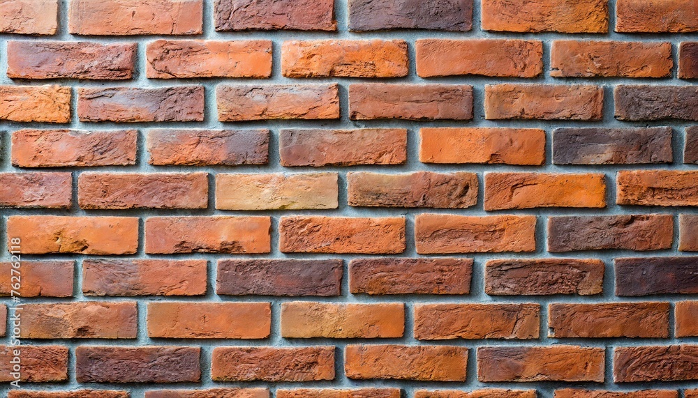 Fototapeta premium reddish orange brick wall textured background