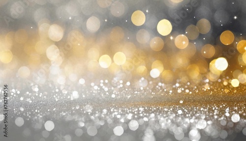 background of abstract glitter lights silver and gold de focused banner