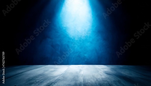 empty space of studio dark room concrete floor grunge texture background with blue lighting effect for product showing