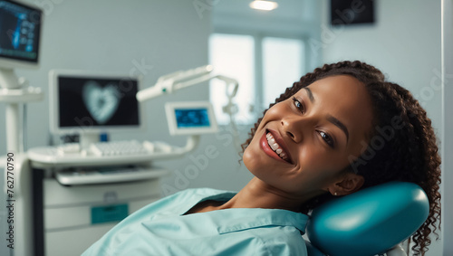 beautiful smiling African girl in the dental chair