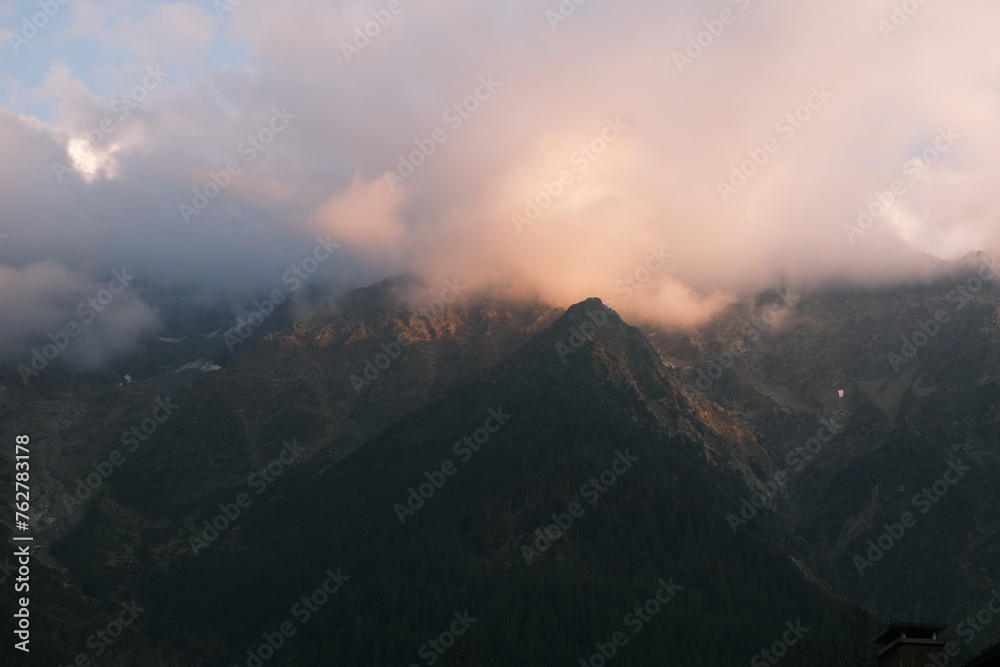 Sunset and mist in the mountains (Dôme du Goûter, Mont Blanc, Chamonix) - obrazy, fototapety, plakaty 