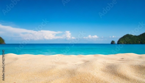 empty sand beach in front of summer sea background with copy space