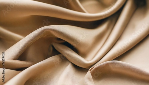 beautiful smooth elegant wavy beige light brown satin silk luxury cloth fabric texture abstract background design copy space card or banner