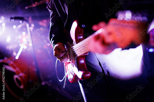 Photography Close-up of a musician playing the electric guitar during a concert